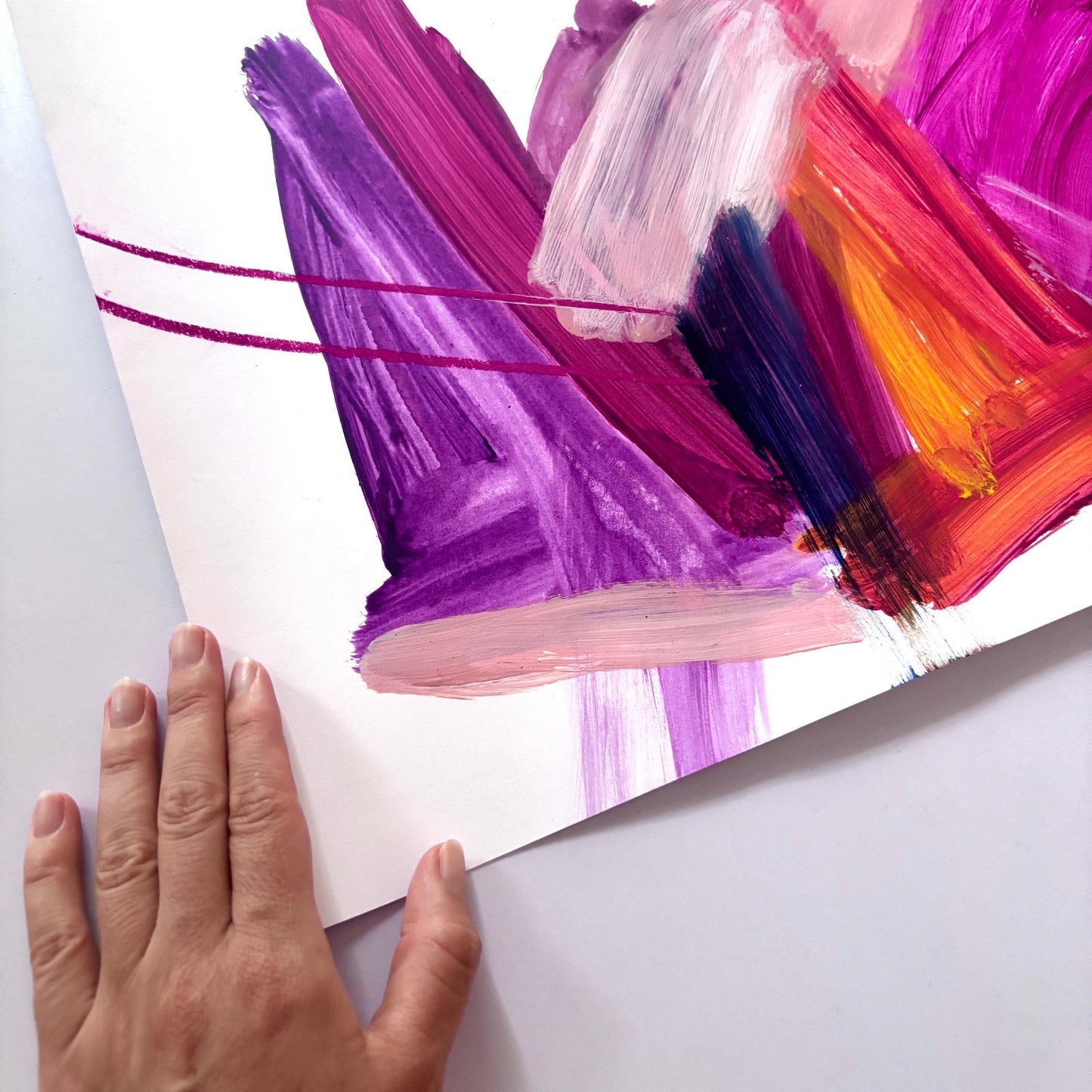 Bright expressive abstract artwork on paper with pink, purple, orange and peach colours