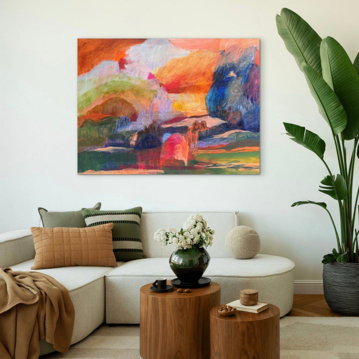abstract landscape painting in a lounge room with large palm