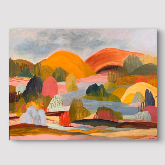 A colorful abstract landscape painting on canvas, featuring stylized hills, trees, and water in warm orange, yellow, green, pink, and blue tones, shown against a light gray background.