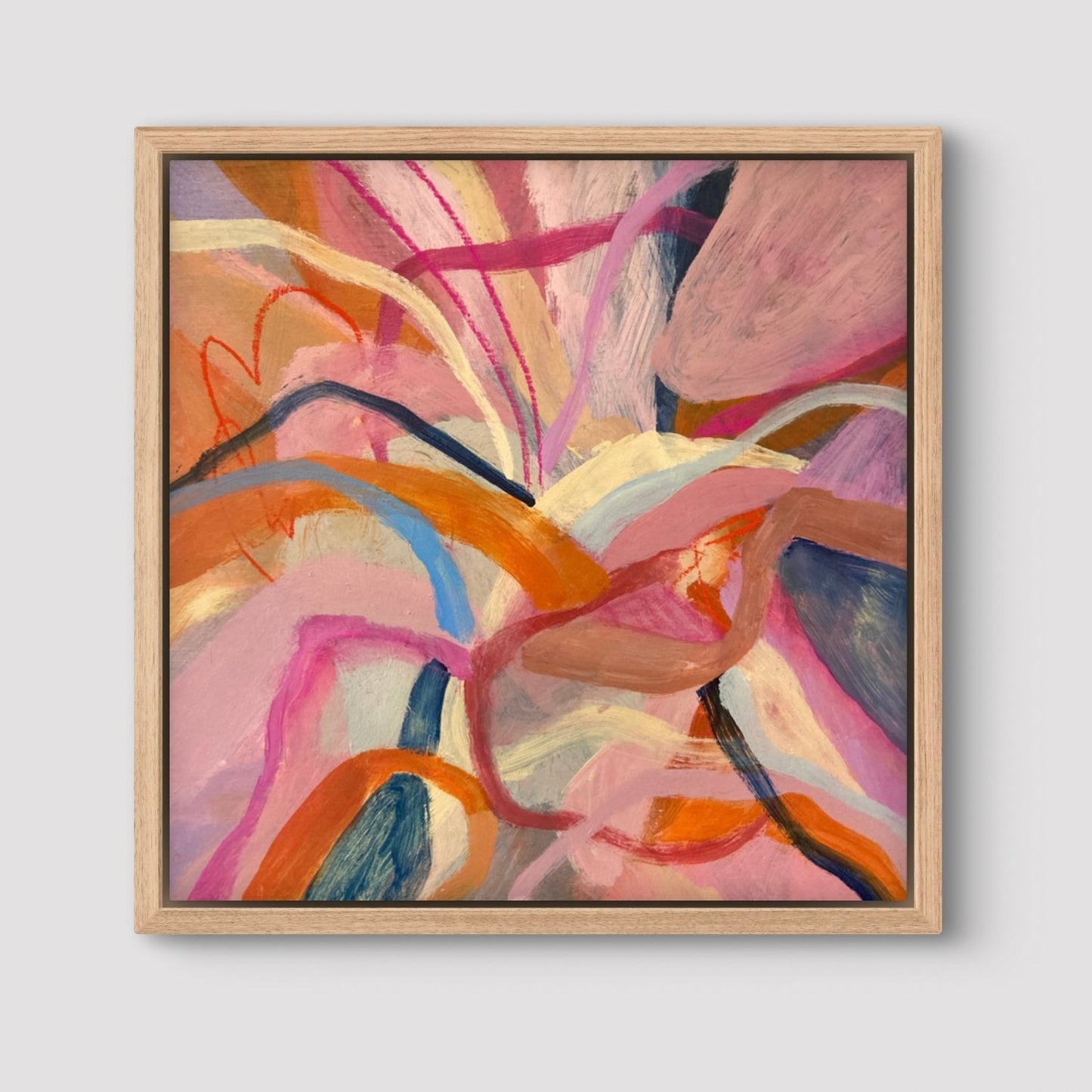 abstract acrylic painting with birght pink, orange and blue colours in an oak frame