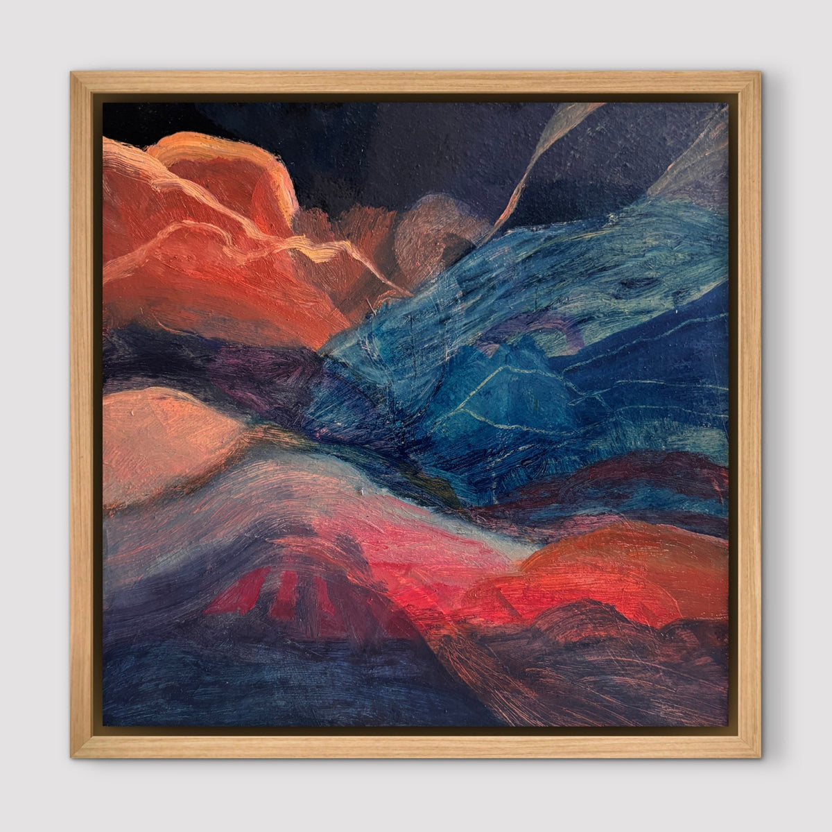 Blue and peach abstract landscape in an oak frame