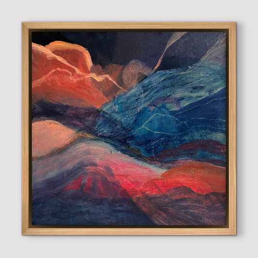 Blue and peach abstract landscape in an oak frame