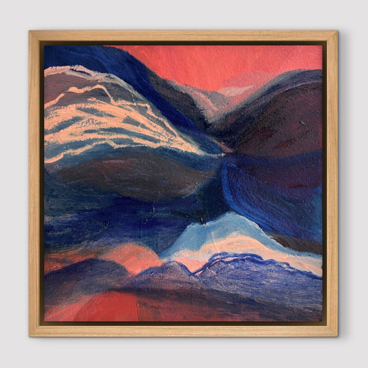 Blue and peach abstract landscape in an oak frame