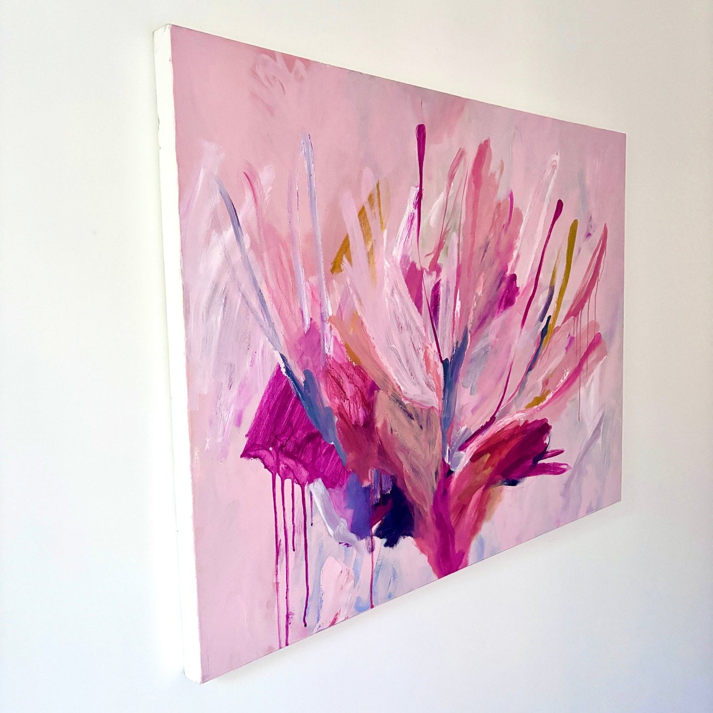 large botanical abstract acrylic painting with bright pink colours on an angle