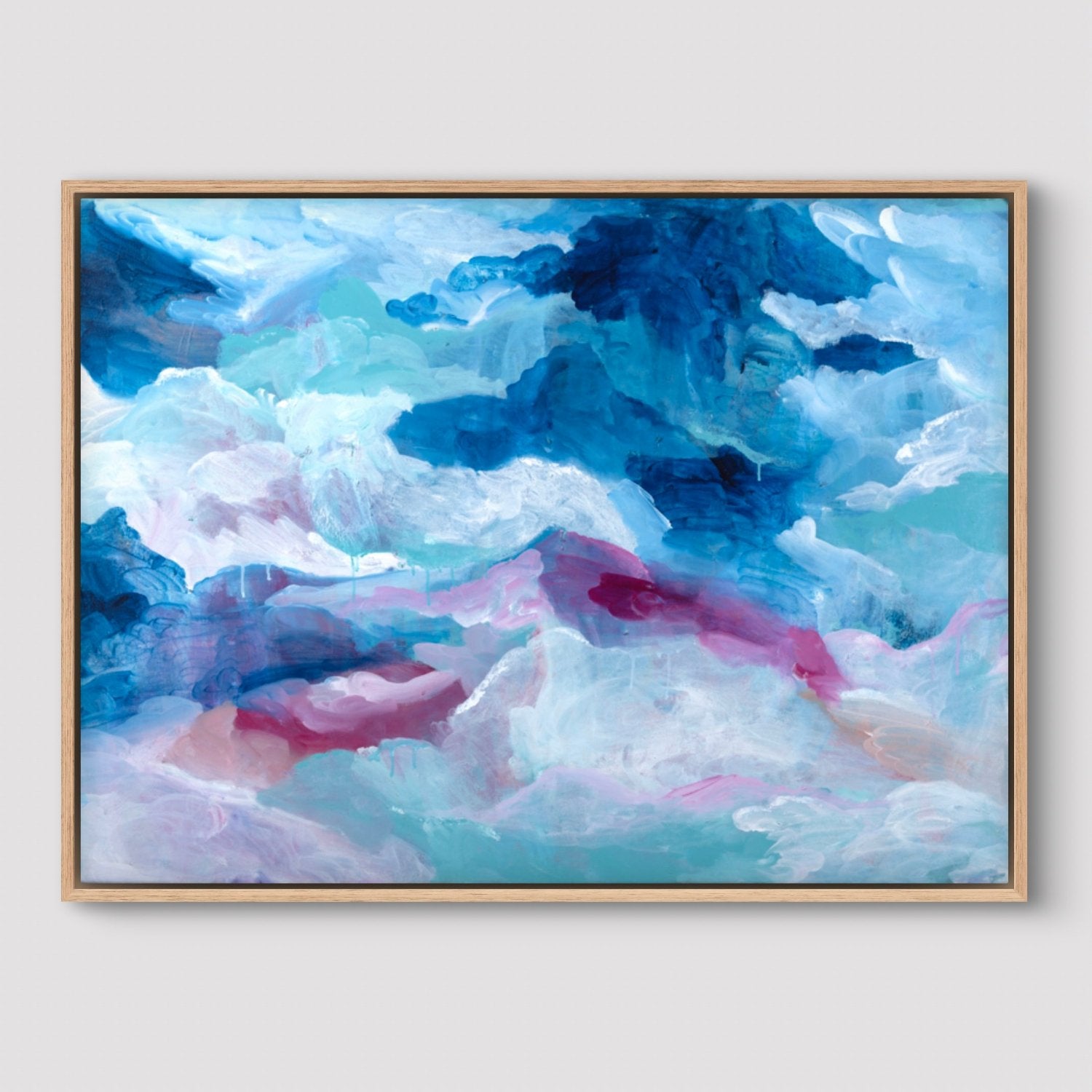 Framed original painting of abstract clouds in pink, blue and white on a neutral background