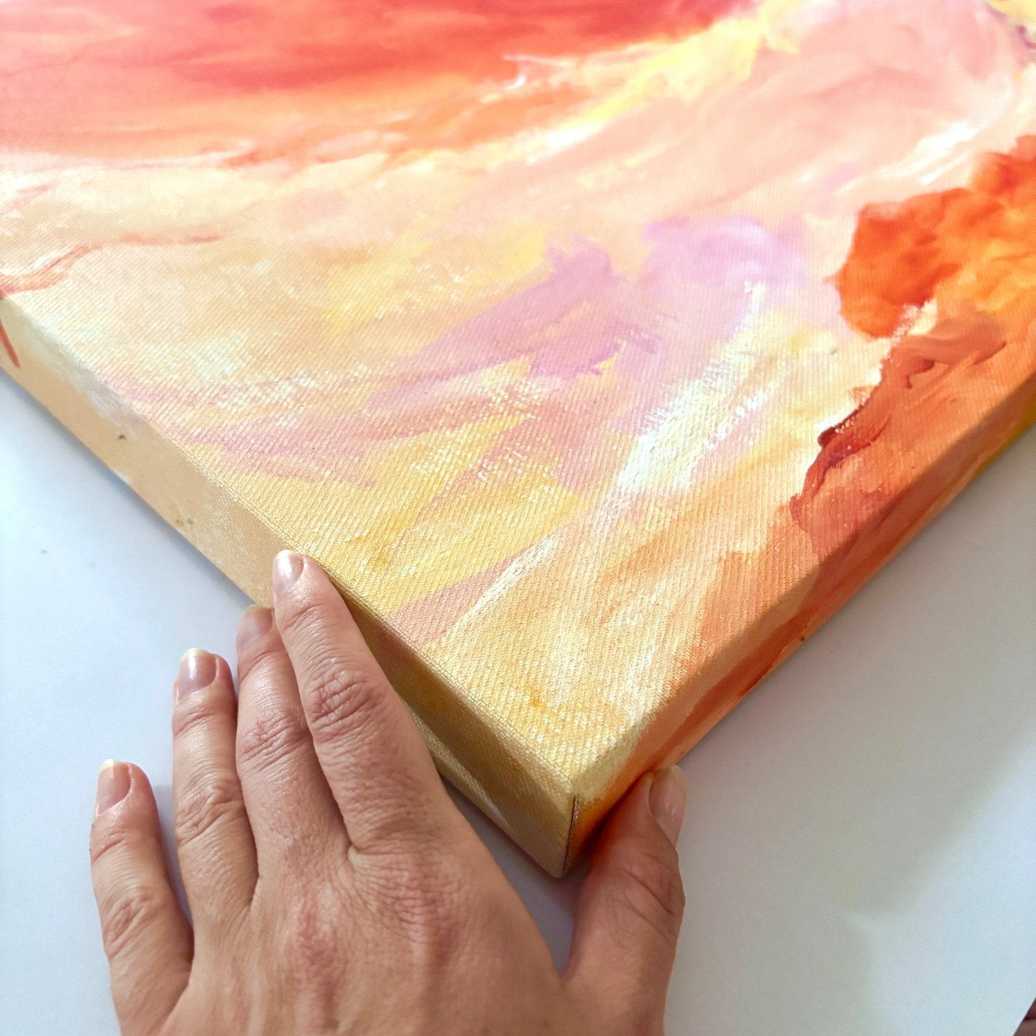 large abstract landscape painting with orange, pink and yellow colours